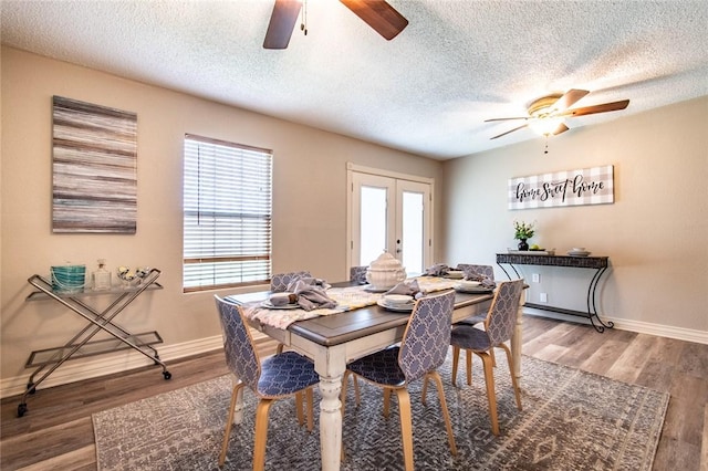 7322 Milky Way Dr, Corpus Christi, TX 78412 - dining area featuring ceiling fan, plenty of natural light, a textured ceiling, wood finished floors, and french doors