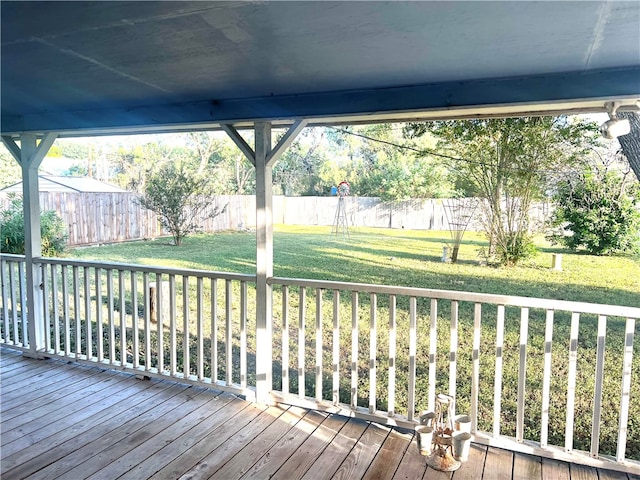 deck featuring a lawn