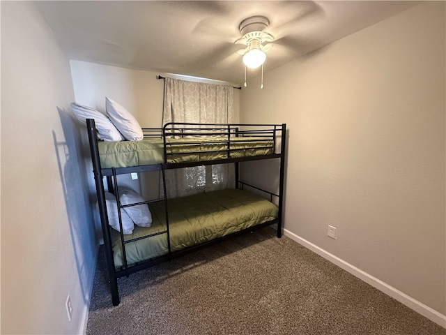 unfurnished bedroom featuring carpet and ceiling fan