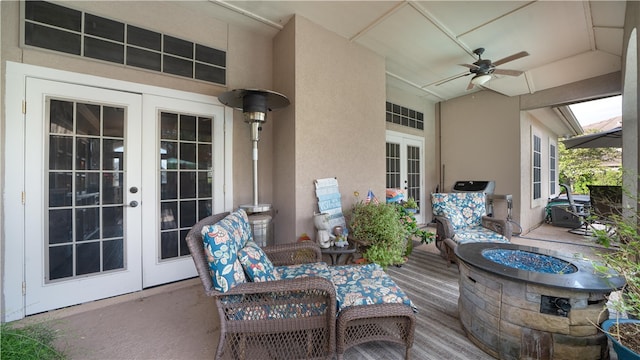 view of patio with french doors and ceiling fan