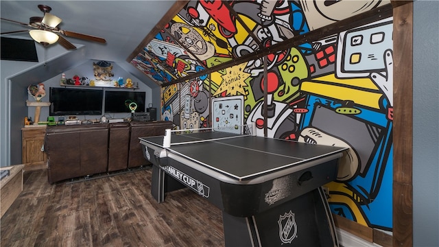 game room with dark hardwood / wood-style flooring, lofted ceiling, and ceiling fan