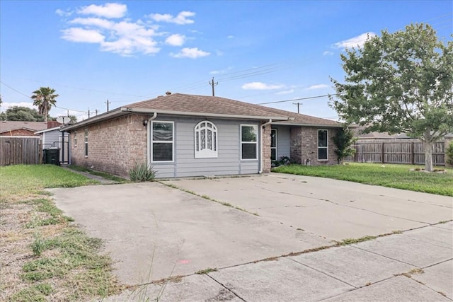 10502 Hemlock Rd, Corpus Christi, TX 78410 - rear view of property with concrete driveway