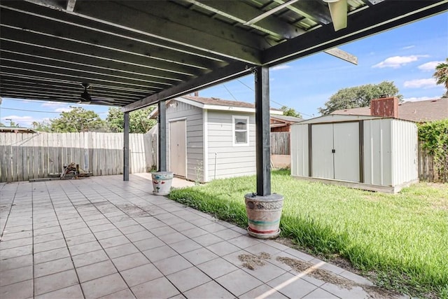 10502 Hemlock Rd, Corpus Christi, TX 78410 - fenced backyard with a storage shed and a patio