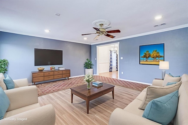 10502 Hemlock Rd, Corpus Christi, TX 78410 - living area with ceiling fan, recessed lighting, light wood finished floors, and crown molding