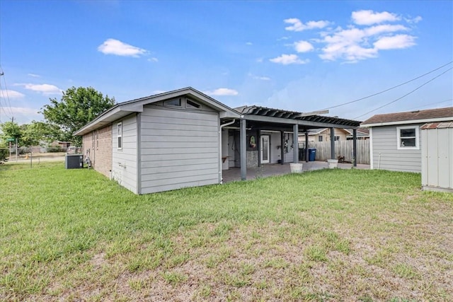 10502 Hemlock Rd, Corpus Christi, TX 78410 - back of house featuring a patio and a shed