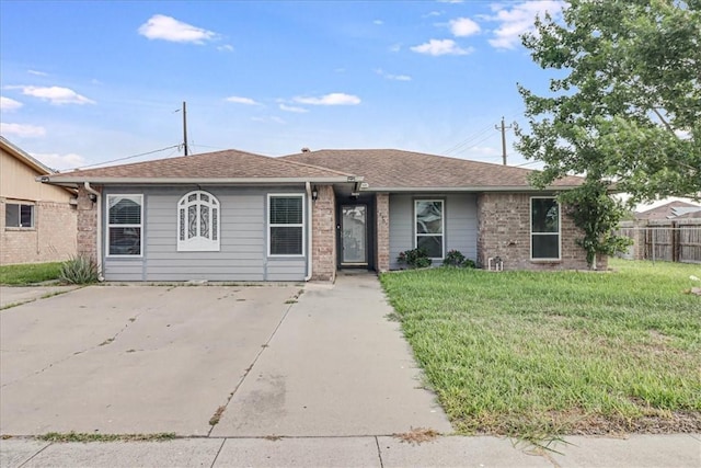 10502 Hemlock Rd, Corpus Christi, TX 78410 - ranch-style home featuring roof with shingles and brick siding