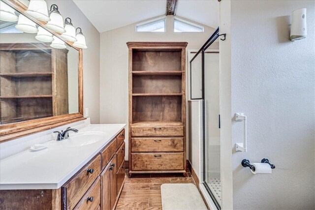 10502 Hemlock Rd, Corpus Christi, TX 78410 - full bath featuring a shower stall, vanity, and vaulted ceiling
