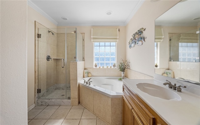 full bath with vanity, a stall shower, crown molding, a bath, and tile patterned floors