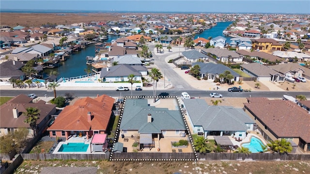 aerial view featuring a residential view and a water view