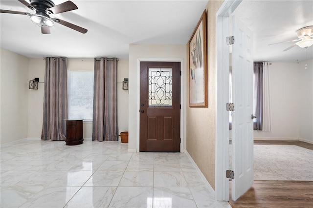 119 Misty Ln, Aransas Pass, TX 78336 - entryway featuring a ceiling fan and baseboards
