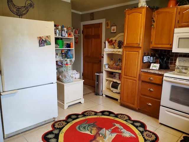 kitchen featuring light tile patterned floors, white appliances, ornamental molding, and backsplash