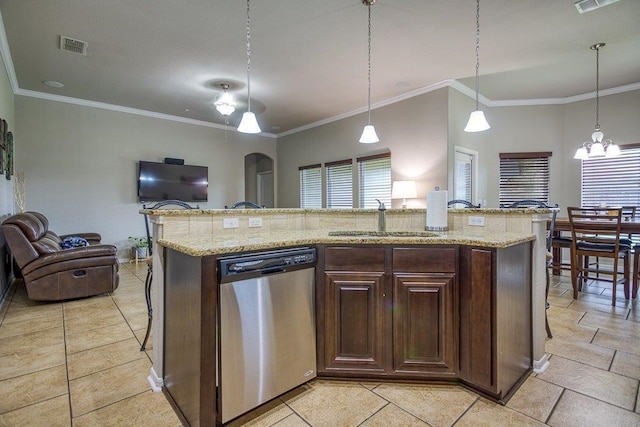 kitchen featuring visible vents, open floor plan, a kitchen island with sink, stainless steel dishwasher, and a sink