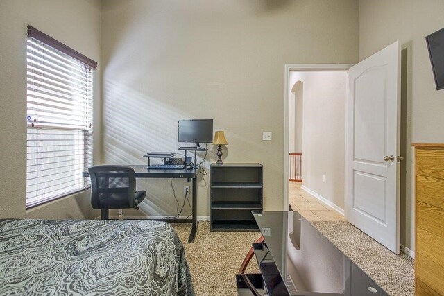 bedroom featuring baseboards