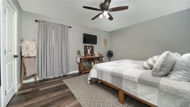 bedroom featuring dark wood-type flooring and ceiling fan