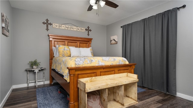 bedroom featuring dark hardwood / wood-style flooring and ceiling fan