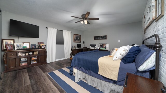 bedroom with ceiling fan and dark hardwood / wood-style floors