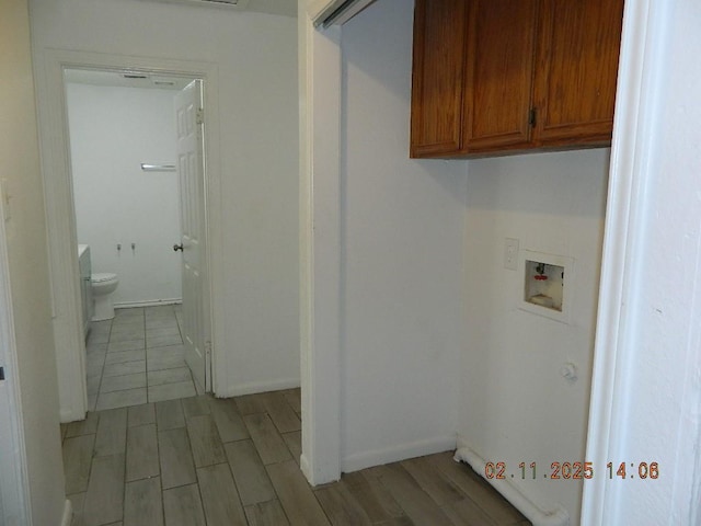 1230 Bernice Dr, Corpus Christi, TX 78412 - laundry room featuring cabinet space, washer hookup, and light wood-style flooring