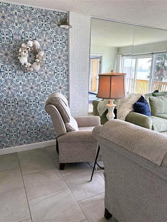 tiled living room with a textured ceiling