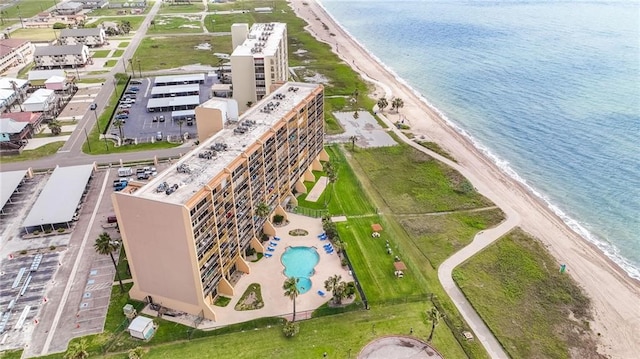 bird's eye view featuring a beach view and a water view