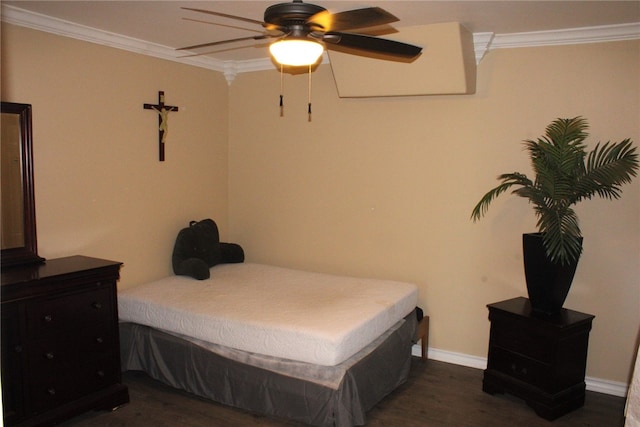 bedroom with ornamental molding, dark hardwood / wood-style floors, and ceiling fan