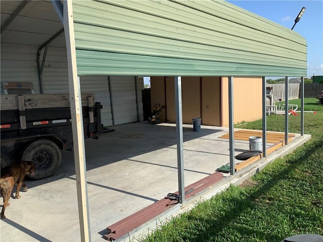 view of patio / terrace featuring a carport