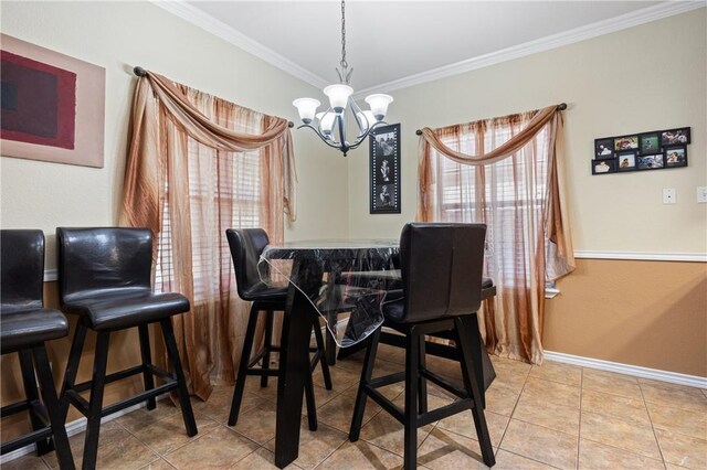 2401 Handlin Dr, Corpus Christi, TX 78418 - tiled dining space with crown molding, baseboards, and a chandelier