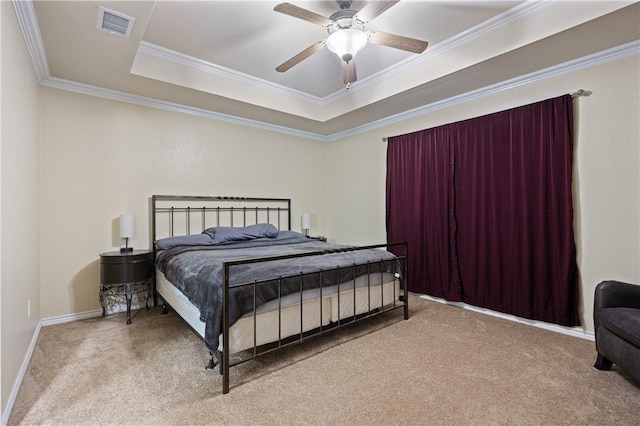 2401 Handlin Dr, Corpus Christi, TX 78418 - bedroom with visible vents, ornamental molding, baseboards, a tray ceiling, and carpet