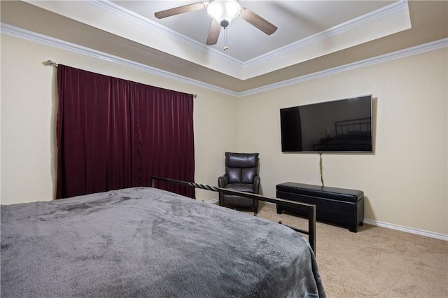 2401 Handlin Dr, Corpus Christi, TX 78418 - carpeted bedroom featuring crown molding, baseboards, ceiling fan, and a tray ceiling