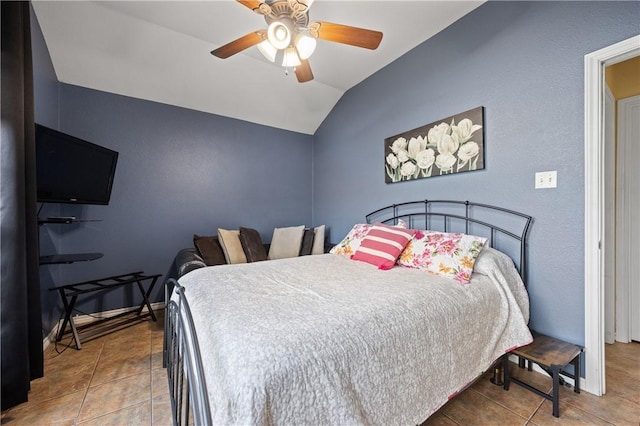 2401 Handlin Dr, Corpus Christi, TX 78418 - bedroom featuring tile patterned floors, ceiling fan, and lofted ceiling