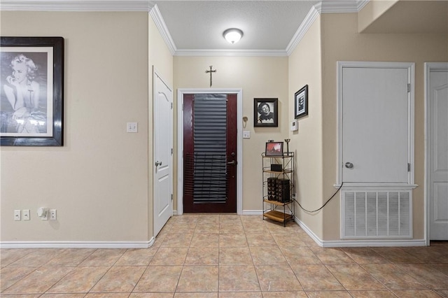 2401 Handlin Dr, Corpus Christi, TX 78418 - tiled foyer featuring baseboards and ornamental molding