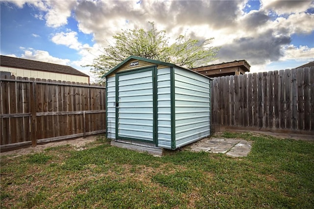 2401 Handlin Dr, Corpus Christi, TX 78418 - view of shed featuring a fenced backyard