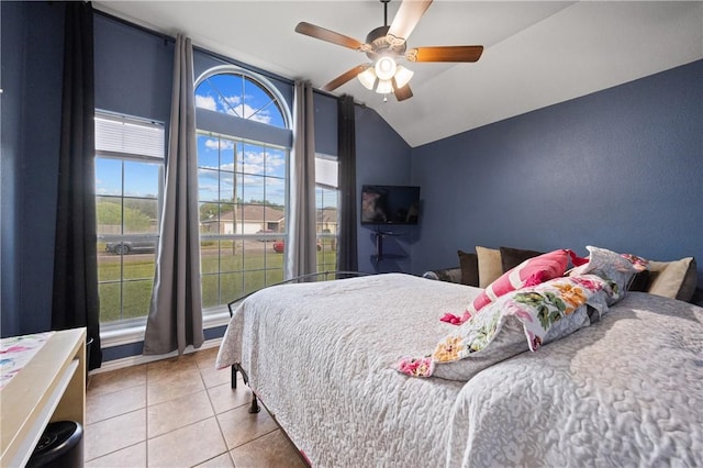 2401 Handlin Dr, Corpus Christi, TX 78418 - tiled bedroom with ceiling fan and lofted ceiling