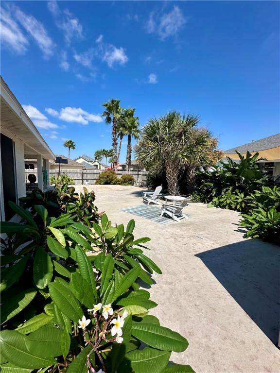 view of patio / terrace featuring fence