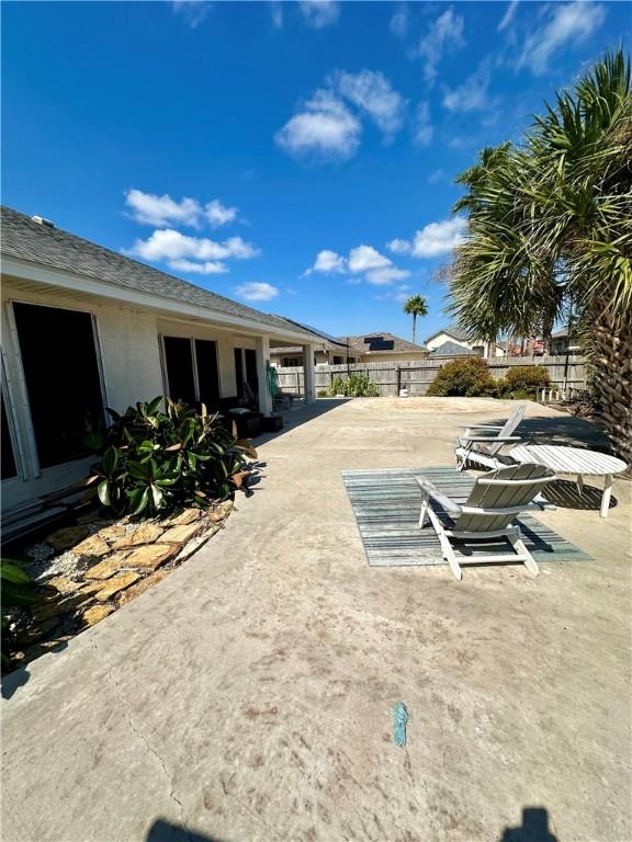 view of yard featuring a patio area and fence