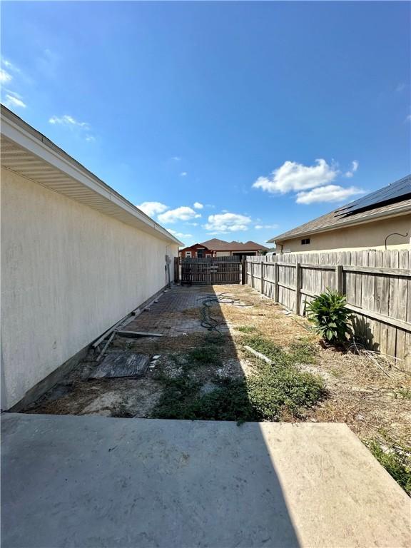 view of yard with a patio area and fence private yard