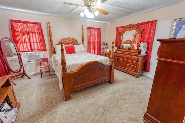 carpeted bedroom featuring cooling unit, ceiling fan, and a textured ceiling