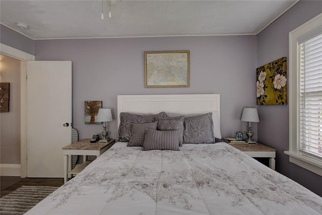 bedroom featuring crown molding