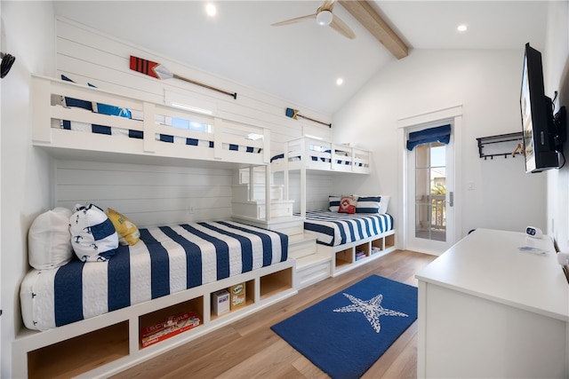 bedroom with beamed ceiling, light wood-type flooring, access to outside, and ceiling fan