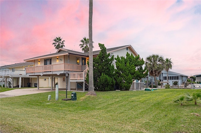 view of front facade with a yard