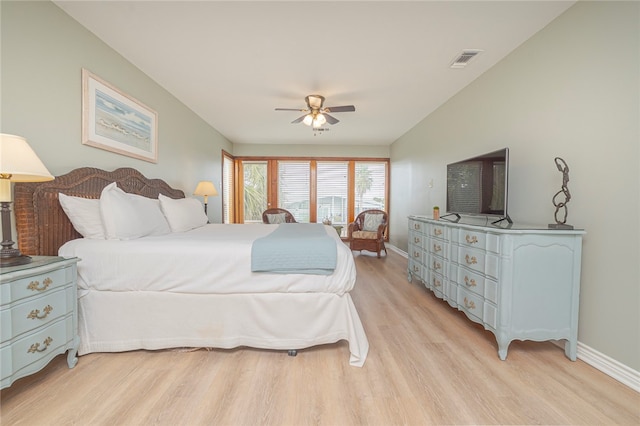 bedroom with light wood-type flooring and ceiling fan