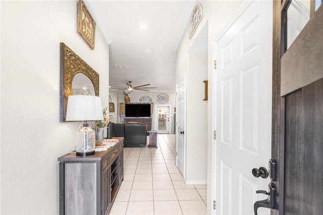 corridor featuring light tile patterned floors