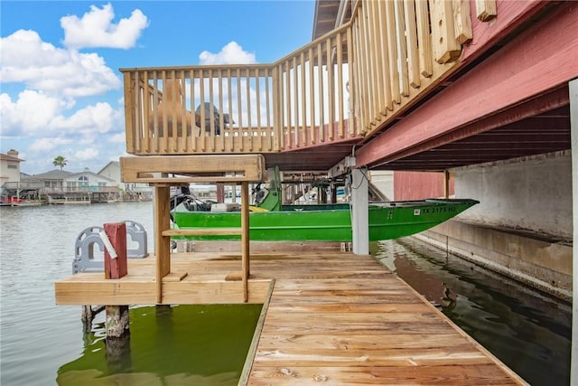 dock area with a water view