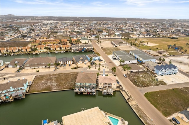 aerial view featuring a residential view and a water view