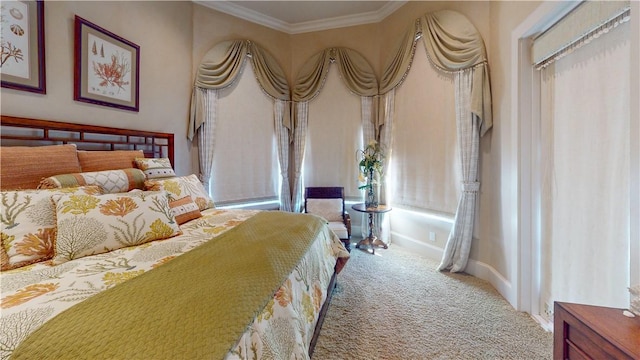 153 E Tuscany Way, Port Oconnor, TX 77982 - carpeted bedroom with ornamental molding and baseboards