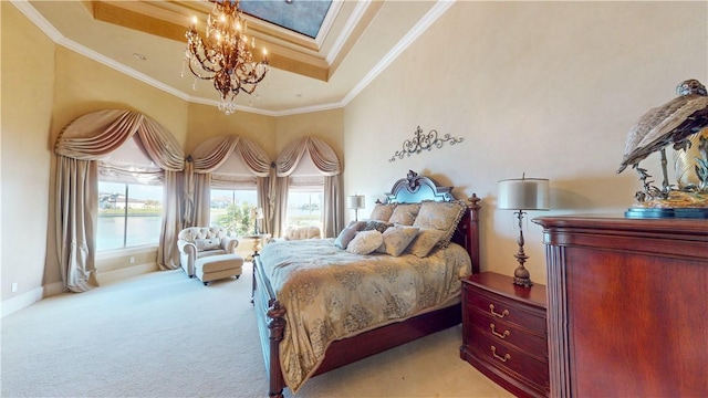 153 E Tuscany Way, Port Oconnor, TX 77982 - carpeted bedroom with a chandelier, ornamental molding, a skylight, a tray ceiling, and baseboards