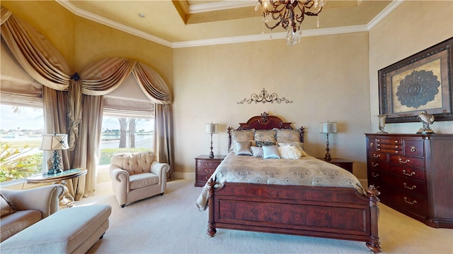 carpeted bedroom featuring a chandelier, a tray ceiling, and ornamental molding