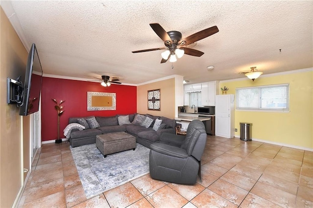 tiled living room with a textured ceiling, ceiling fan, and ornamental molding