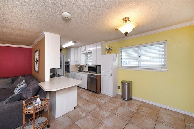 kitchen featuring white cabinets, crown molding, a textured ceiling, kitchen peninsula, and stainless steel appliances