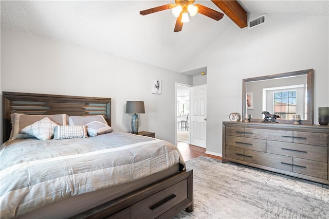 3029 White Bird Dr, Corpus Christi, TX 78415 - bedroom featuring beam ceiling, light wood-type flooring, a ceiling fan, and high vaulted ceiling