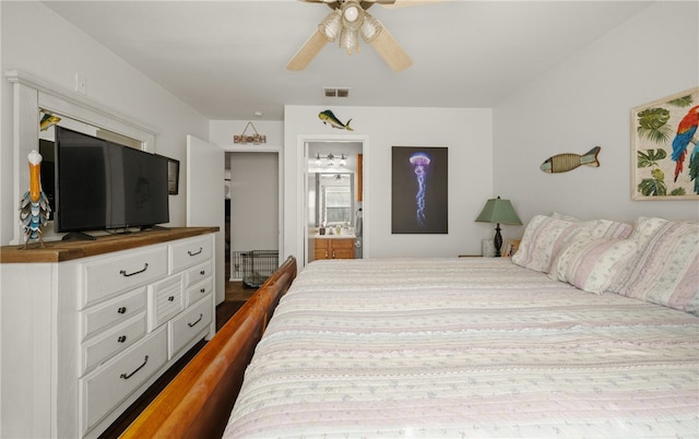 bedroom with ceiling fan and ensuite bathroom